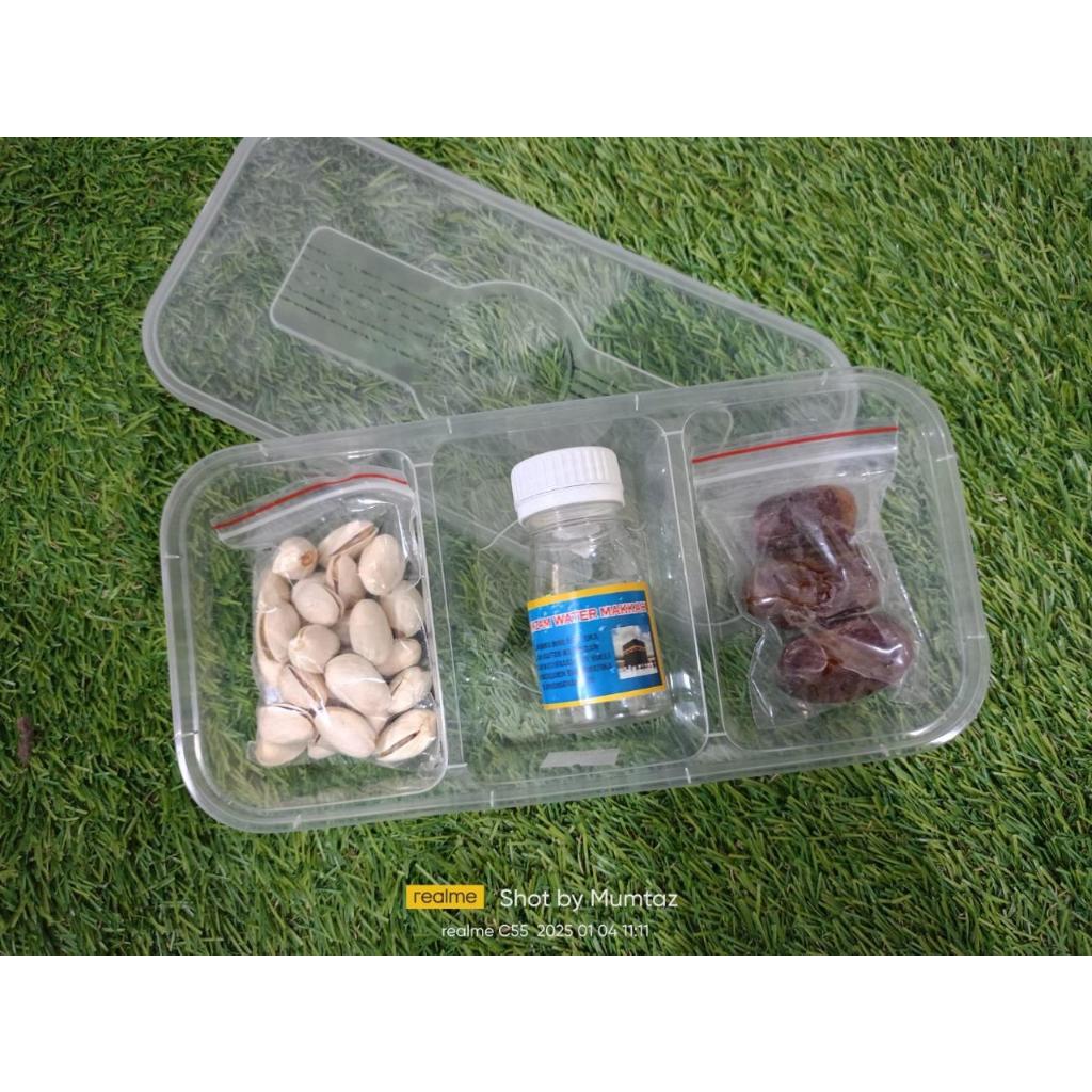 

Paket Oleh-Oleh Haji/Umroh Mina 15k dengan Kacang, air Zam-zam, dan kurma dalam Kotak Plastik Gift
