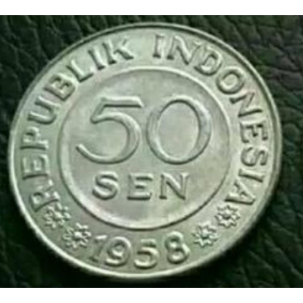 Uang kuno 50 sen garuda . Koin 50 sen