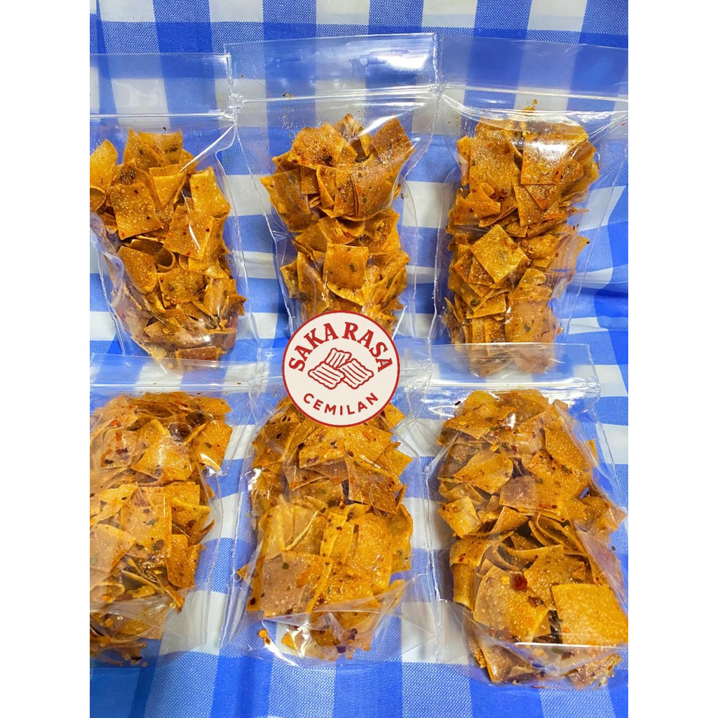 

KRIPIK PANGSIT pedas daun jeruk kemasan 65gr