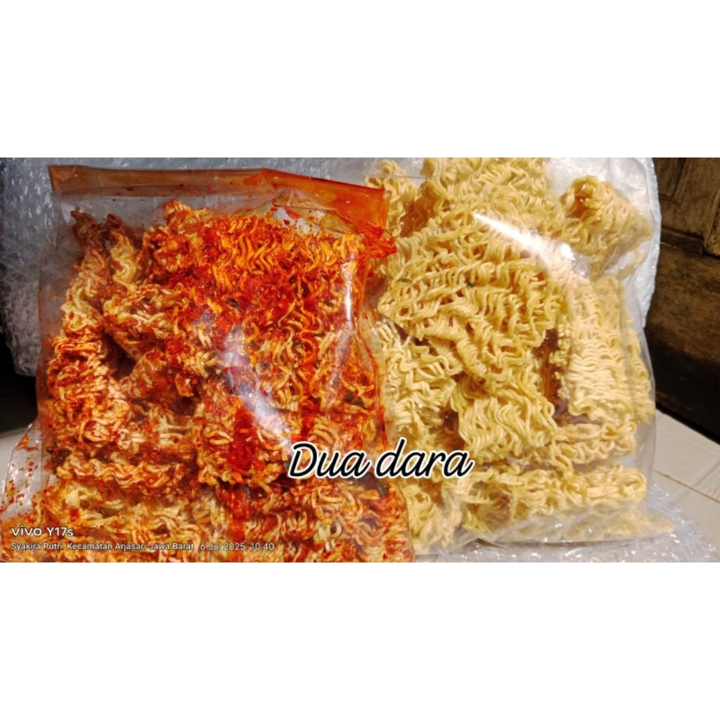 

Paket irit 1kg Mie Kremes rasa pedas 500gr original 500gr daun jeruk