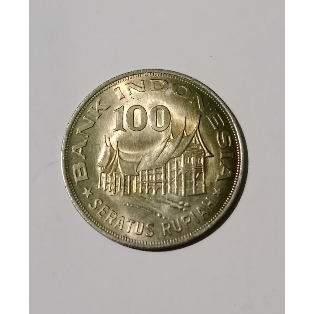 koin kuno 100 rumah gadang
