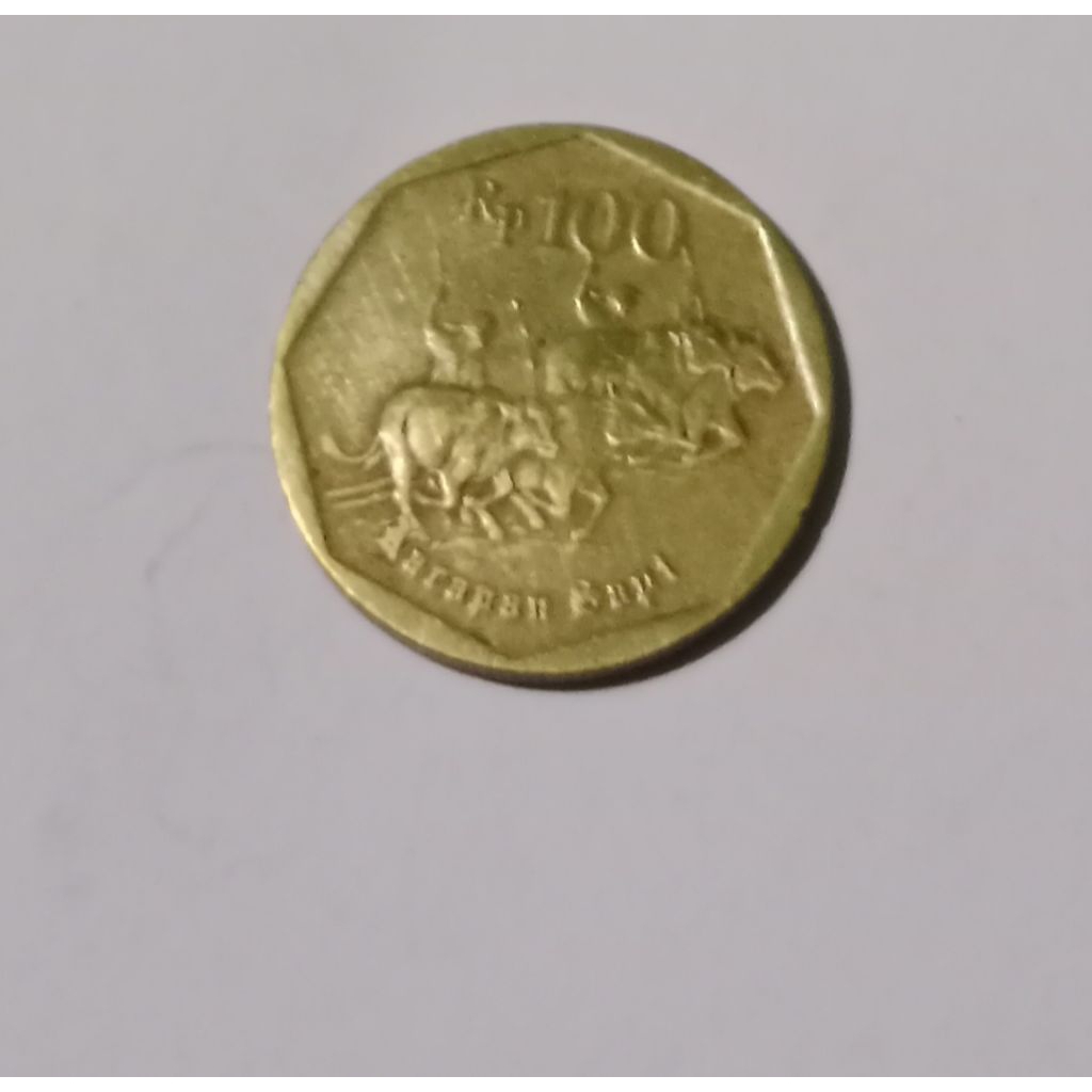 koin kuno 100 rupiah karapan sapi
