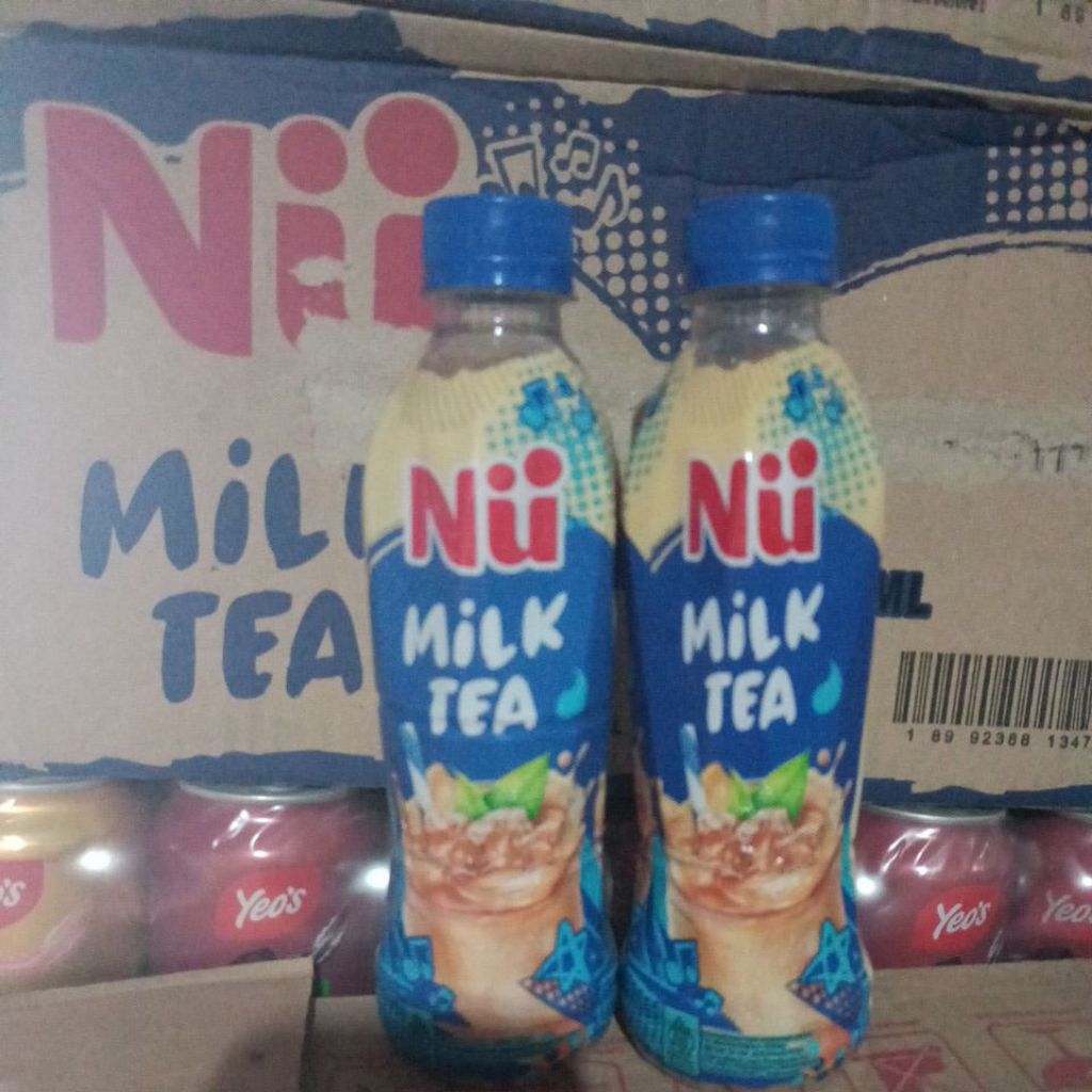 

NU milk tea 330 ml botol isi 24