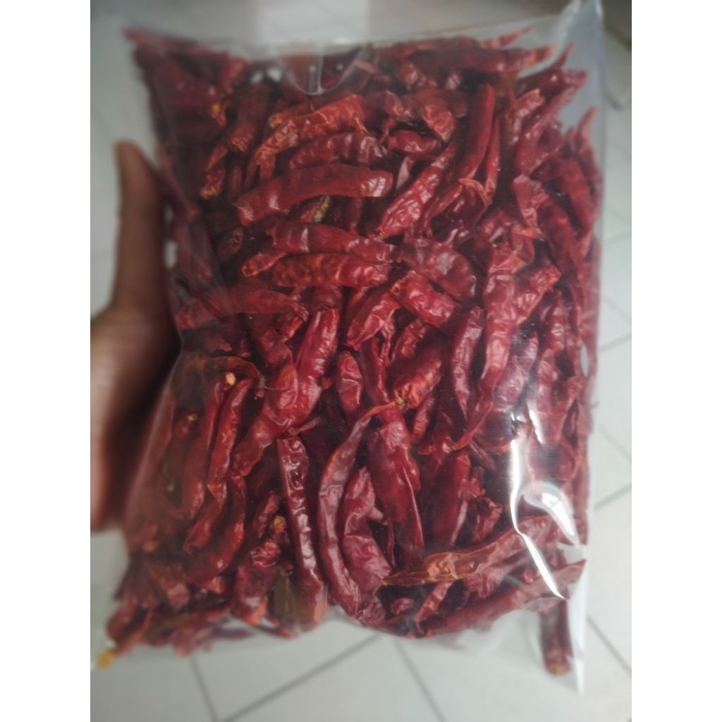 

CABE RAWIT MERAH TEJA KERING TANPA TANGKAI 250 gram