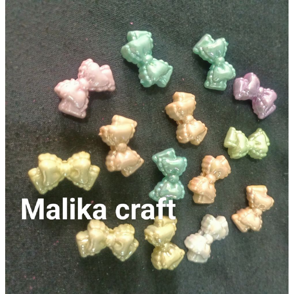 

Manik 2,5cm pita double susu glosy mix warna isi 1 pon ( lubang ada di tengah, tembus atas bawah)