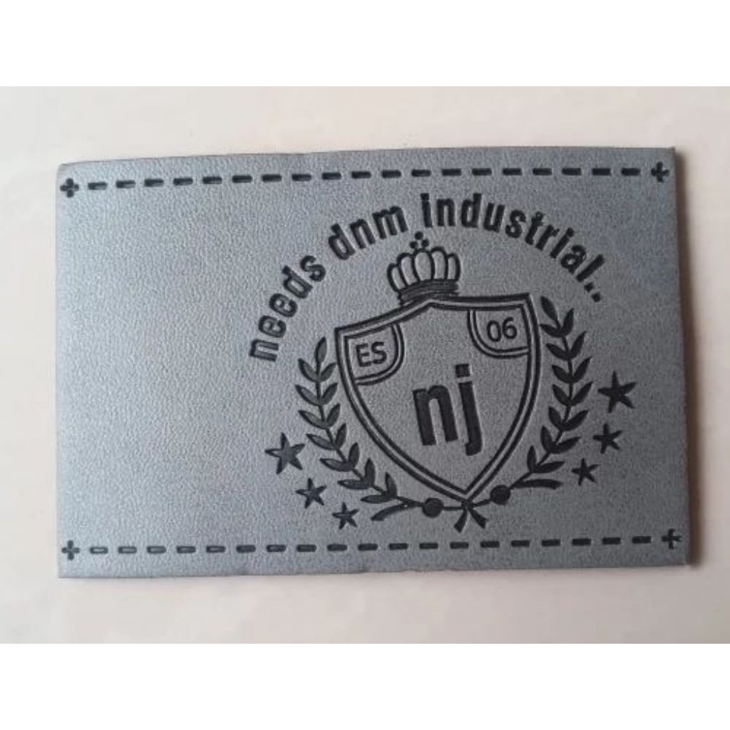 label celana panjang jeans pria