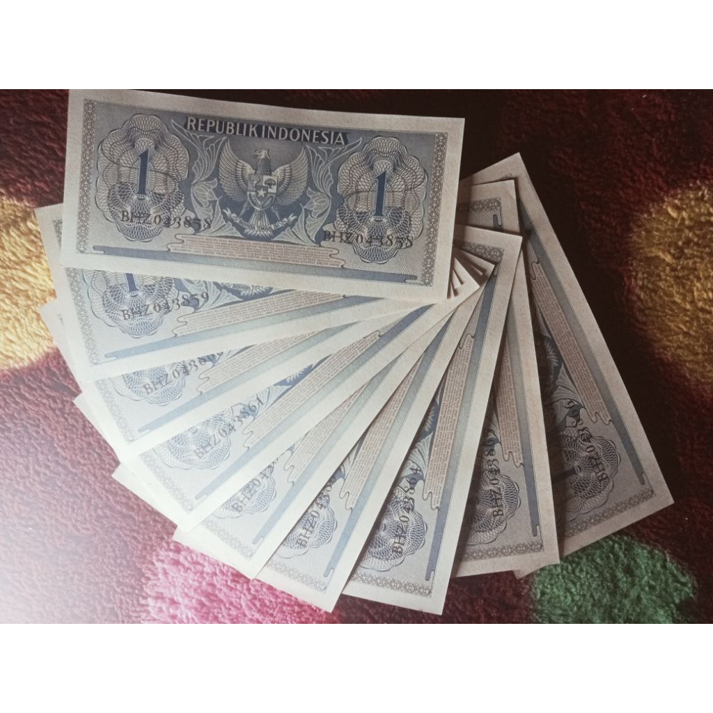 9 lembar 1 rupiah 1954/56 aunc/unc