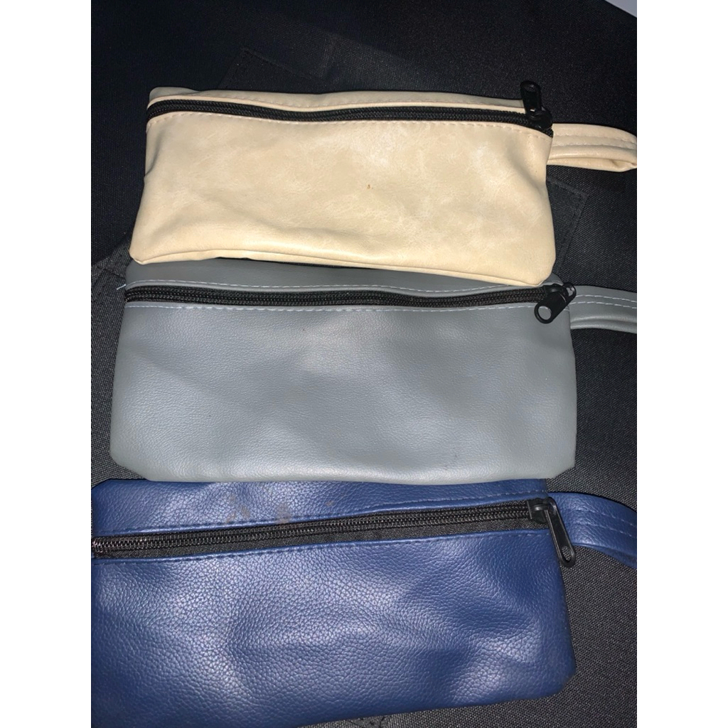 

tempat pensil sleting bagian depan