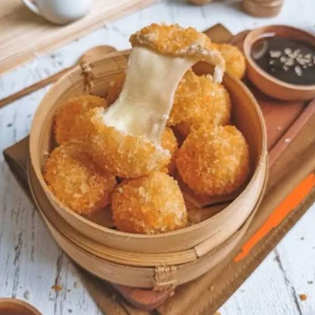 

Cemilan enak CIMOL CRISPY MOZZARELA dengan saos berat 500gr