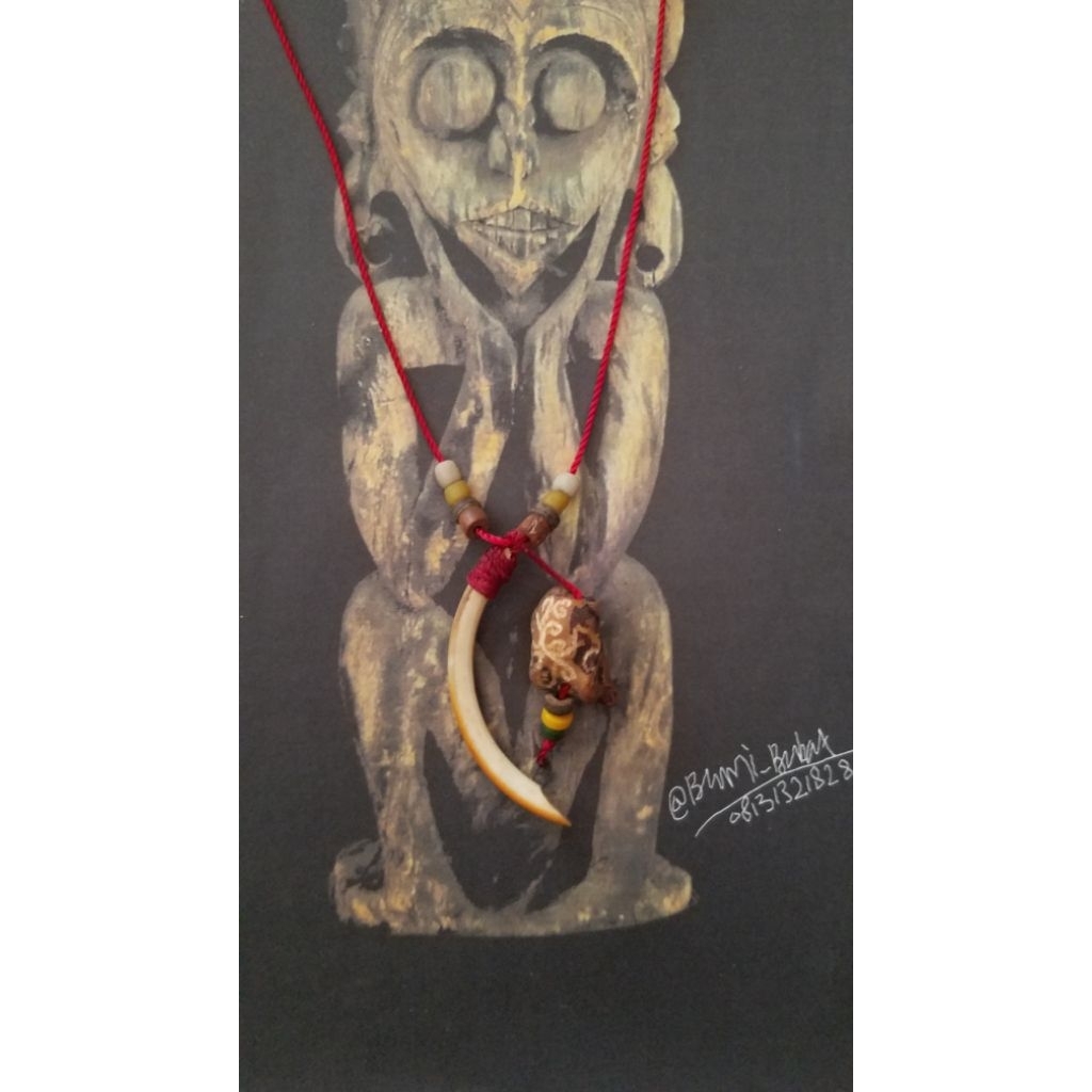 kalung etnik taring landak hutan