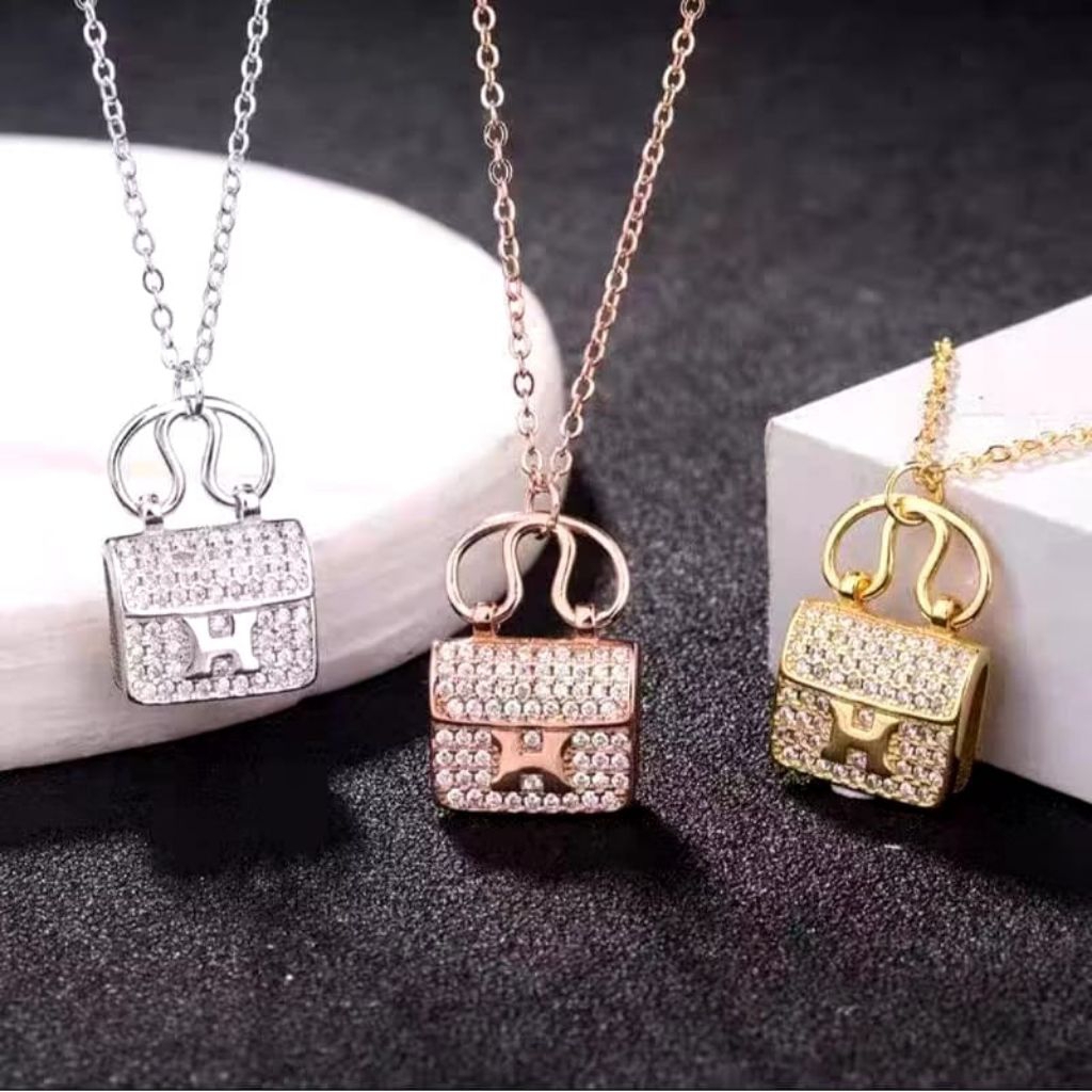 Kalung jurai liontin tas Titanium kalung wanita/ fashion terbaru