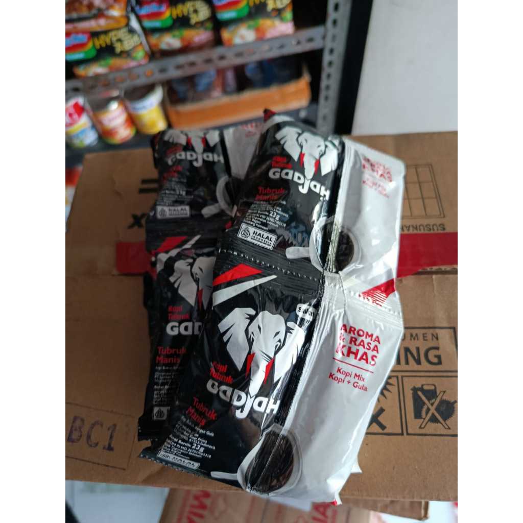 

Kopi Tubruk Gadjah Kopi Mix ( Kopi + Gula ) Renteng 10 Sachet x 23g