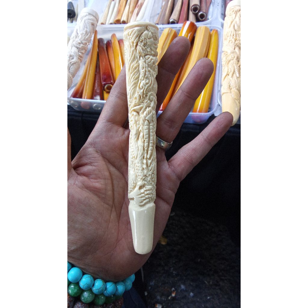 once sari gading ukir naga