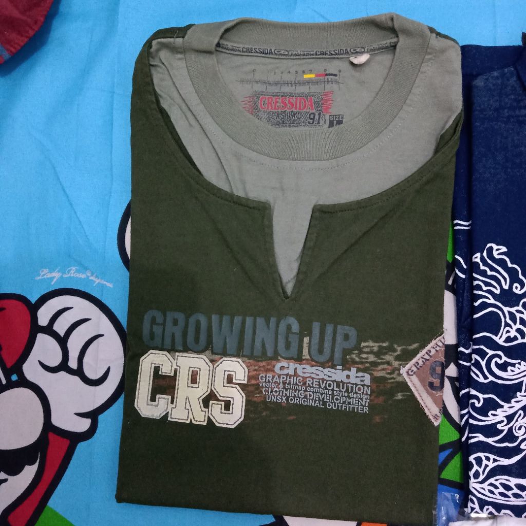 Preloved kaos cressida pria ori size L