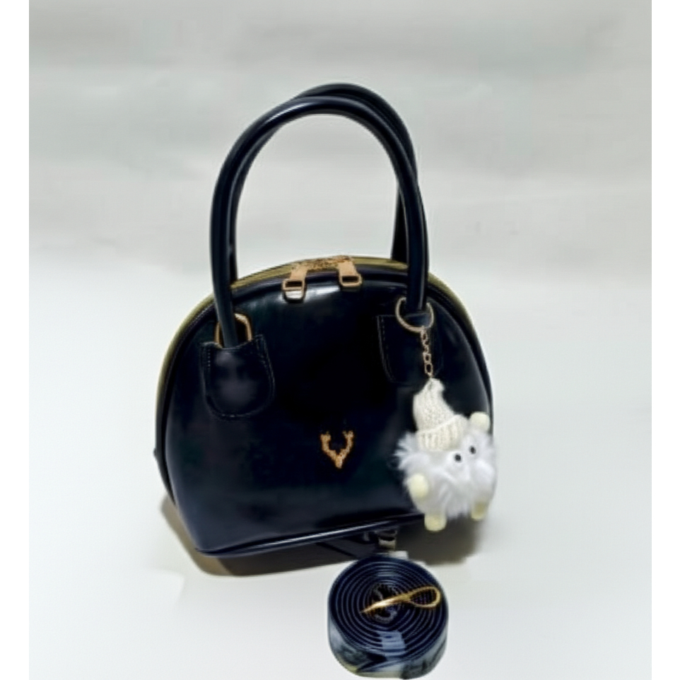 Nama: Tas Tangan "Tipe: Tas Satchel Mini Fitur:  Warna: Hitam pekat dan cokelat.  Bahan: Kulit sinte