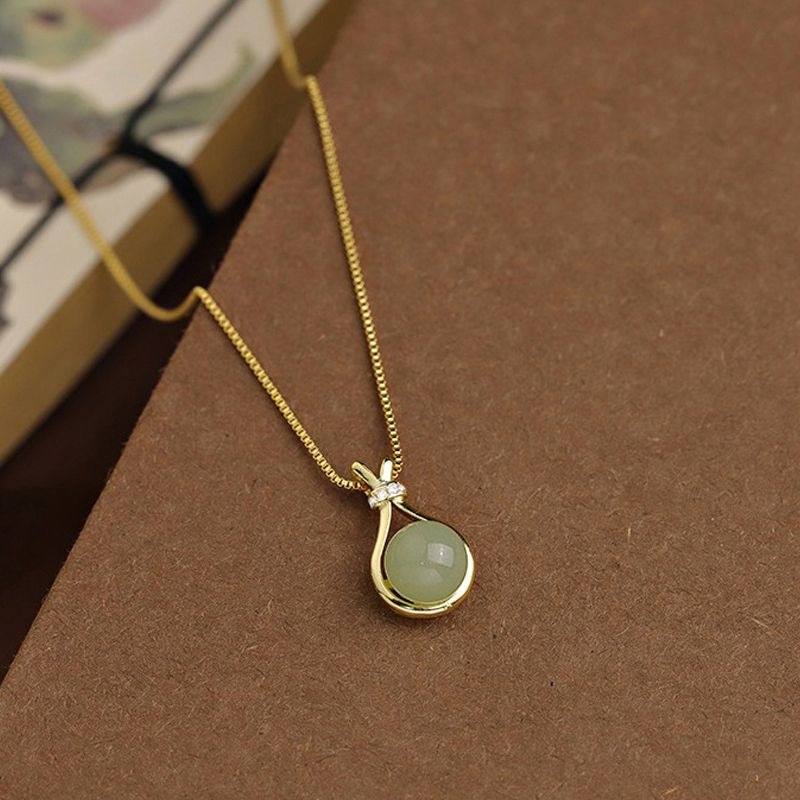 KALUNG  WANITA  KALUNG TITANIUM GOLD GIOK KALUNG TAS KEBERUNTUNGAN HIJAU WANITA LIONTIN  SEDERHANA