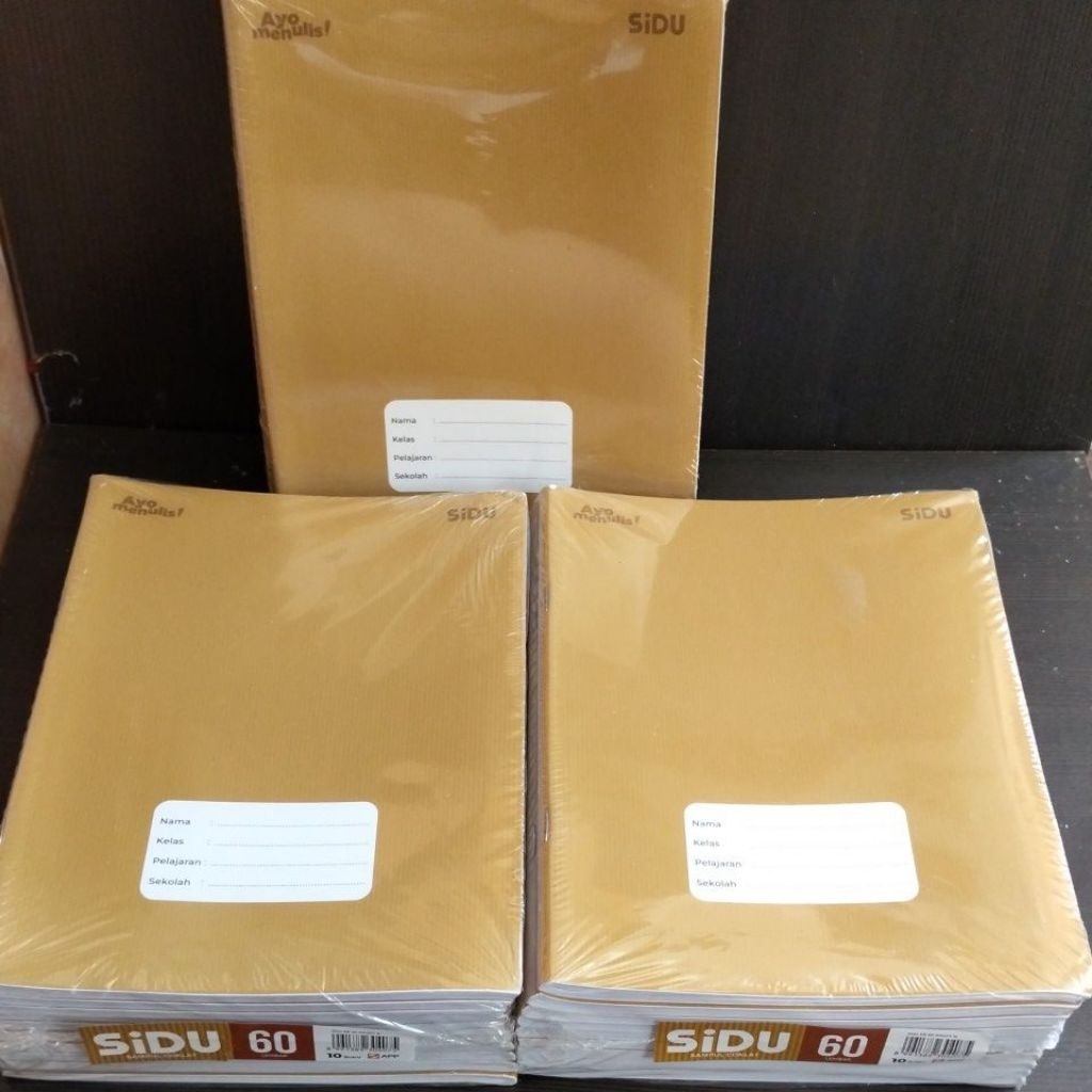 

SIDU BUKU TULIS 60 LEMBAR COVER COKLAT + NAMA 1 PAK ISI 10 BUKU