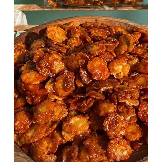 

Emping melinjo pedas manis 500grm/1000grm