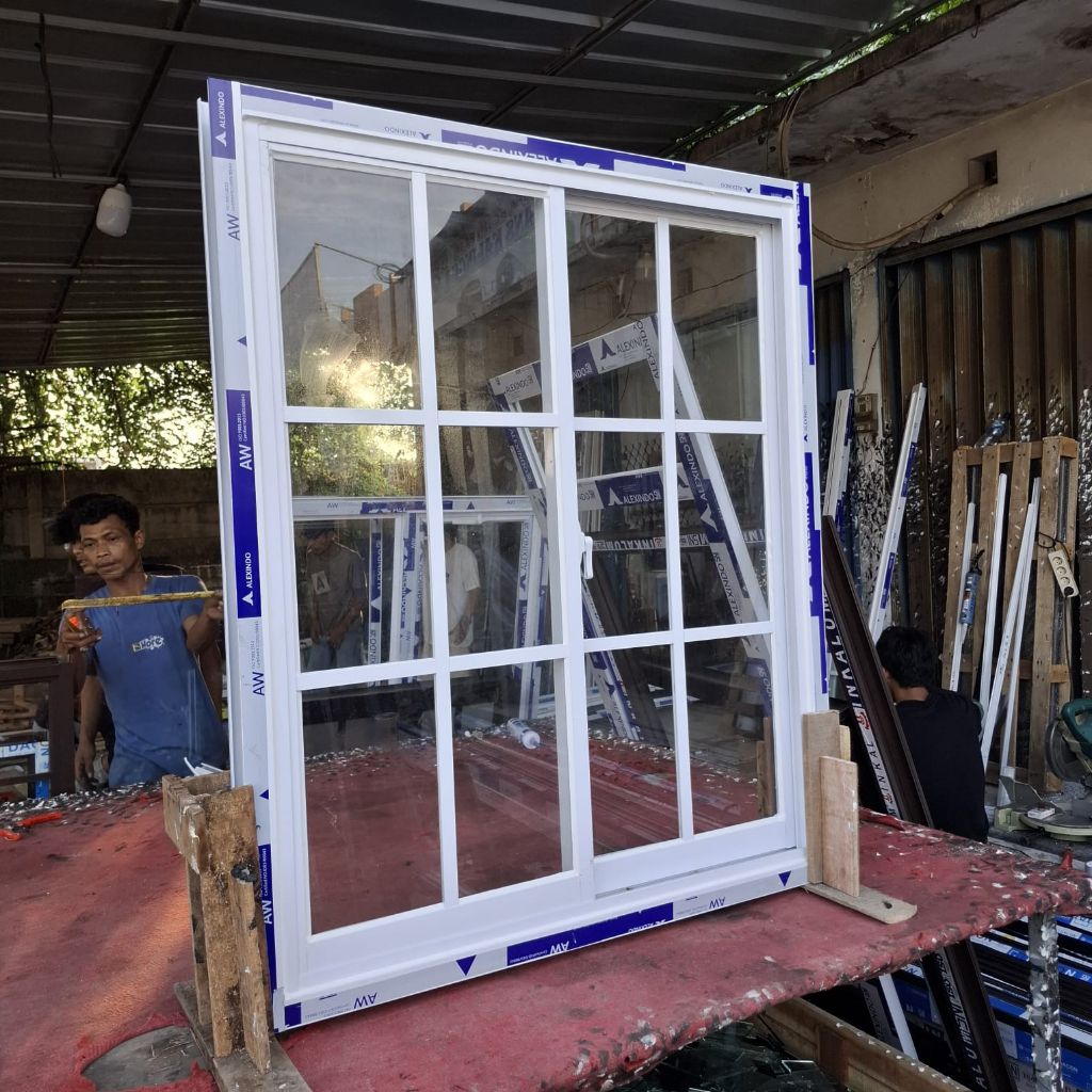 jendela geser 2 daun kusen aluminium merek alexindo  kaca 5mm ukuran L 120 T 100