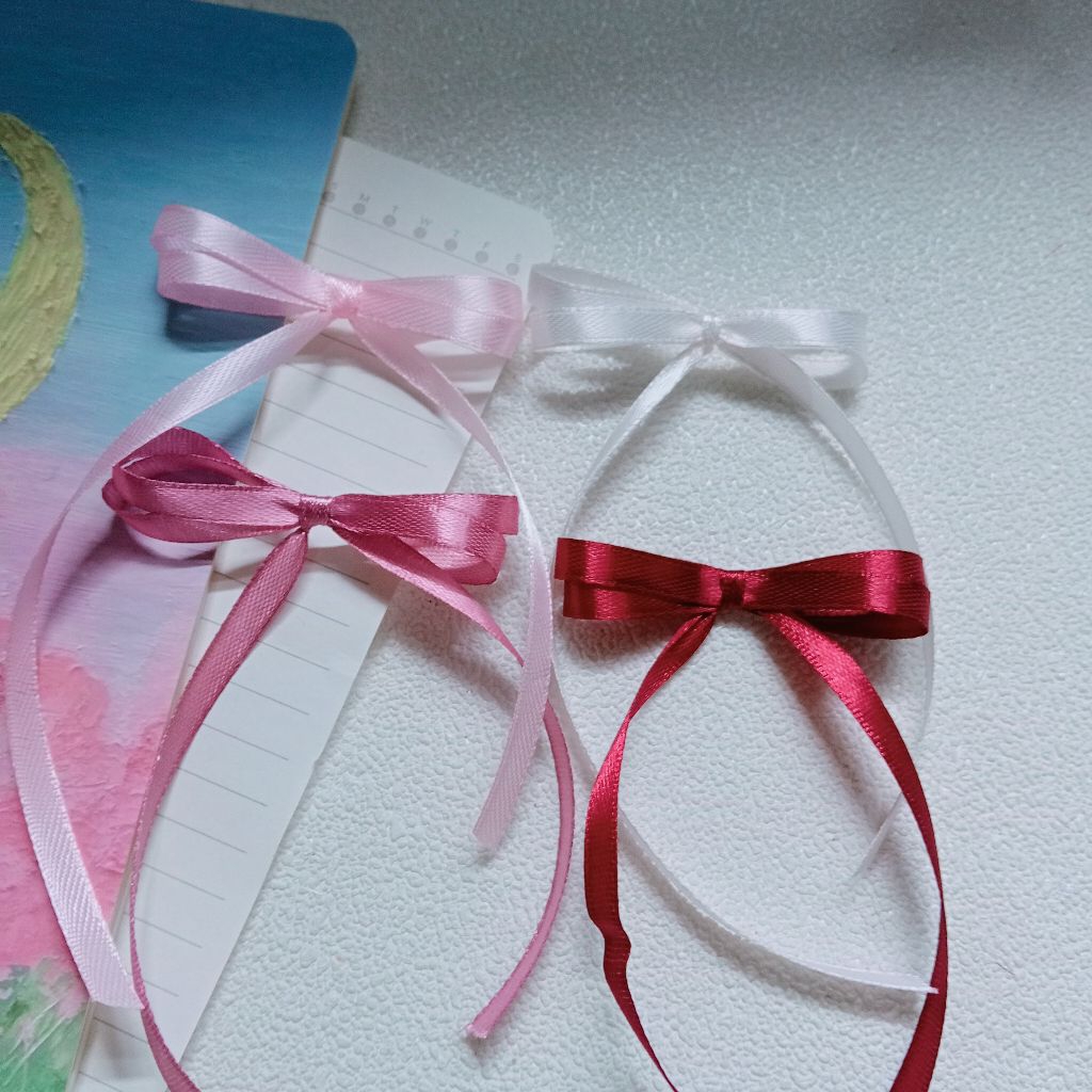 

hiasan dinding/hiasan packing/pita souvenir/pita mini/pita hiasan