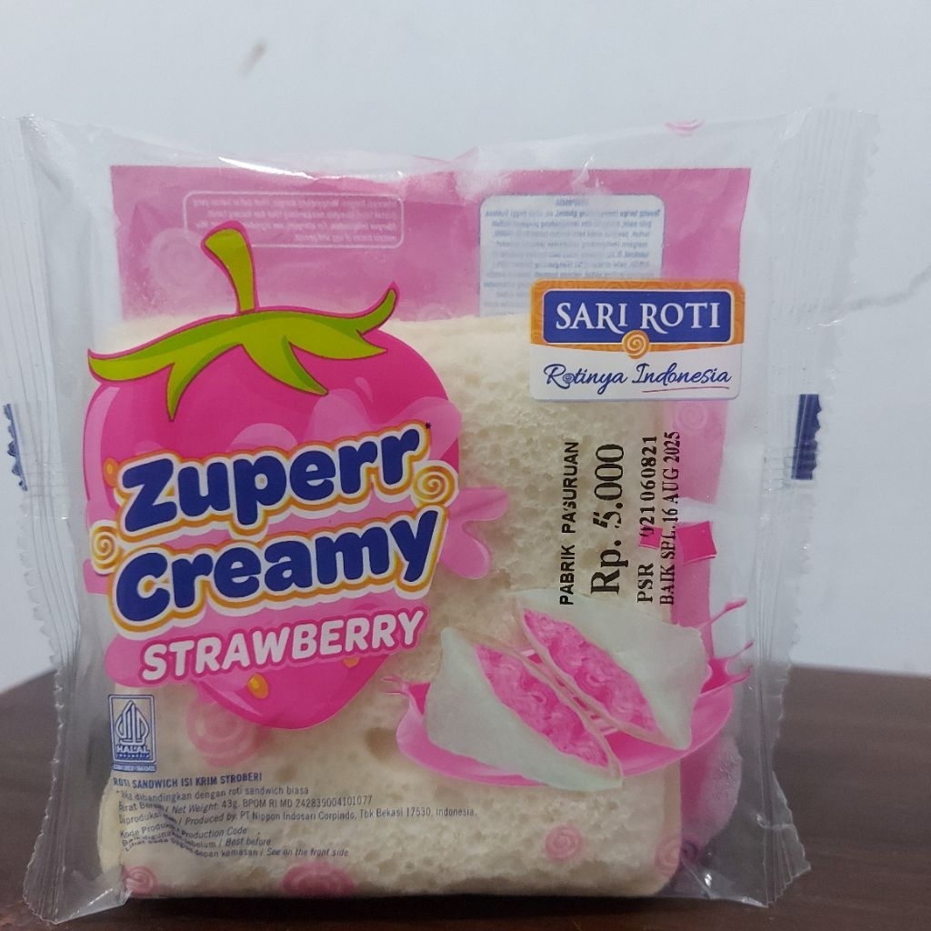 

Sari Rotu Zuperr Creamy Strawberry Roti Sandwich isi Krim Stoberi 40gr x 2 pcs