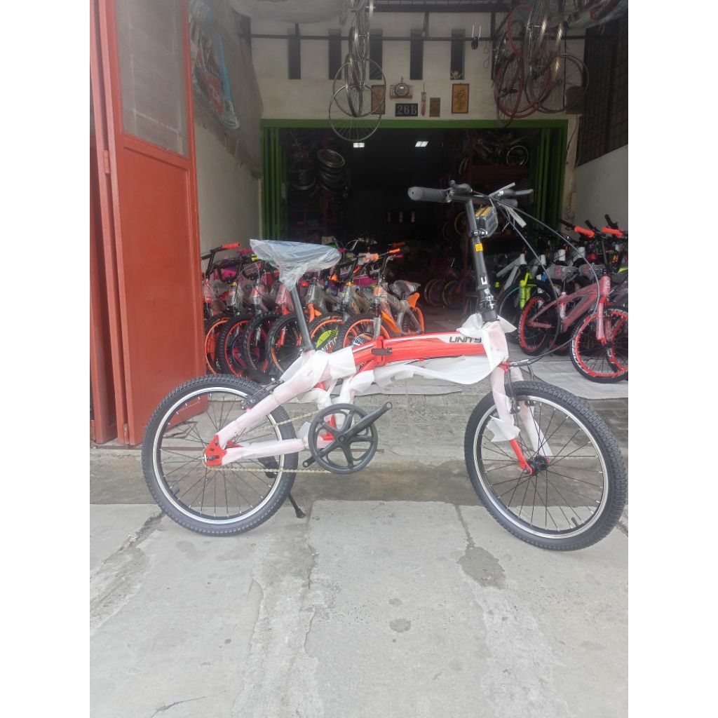 sepeda lipat merk unity rocket 20 inci