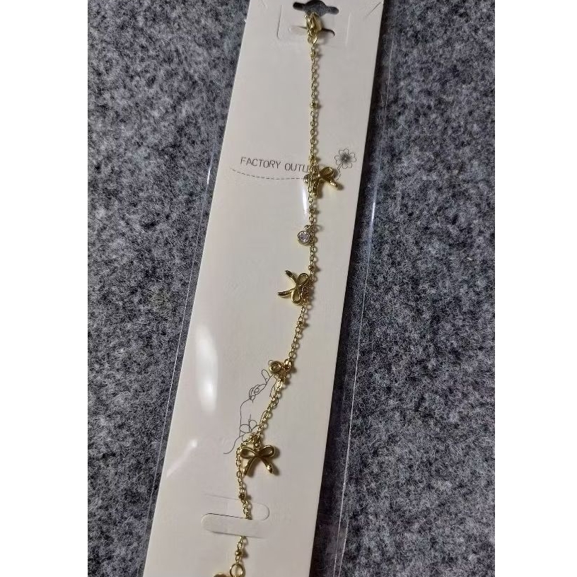 Gelang Pita Gold Titanium