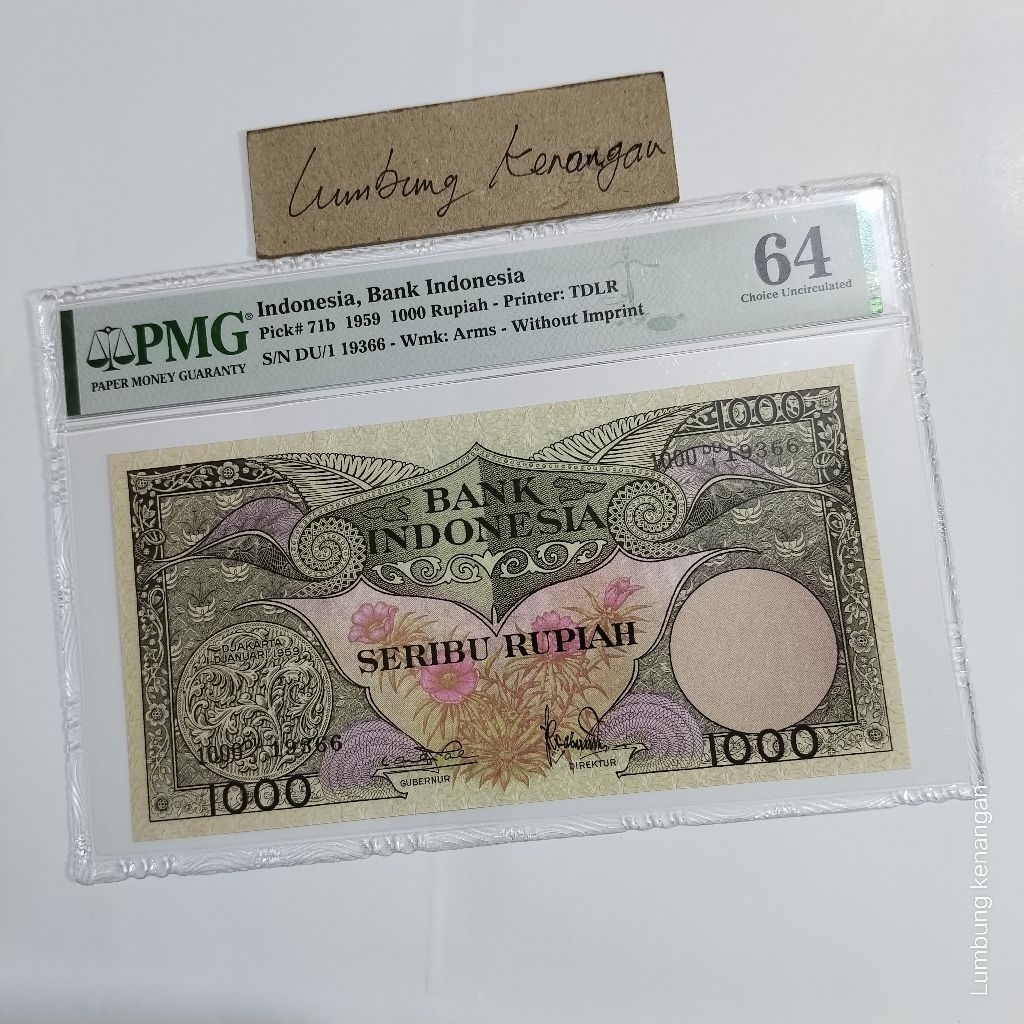 uang kuno 1.000 Rupiah Bunga PMG 64