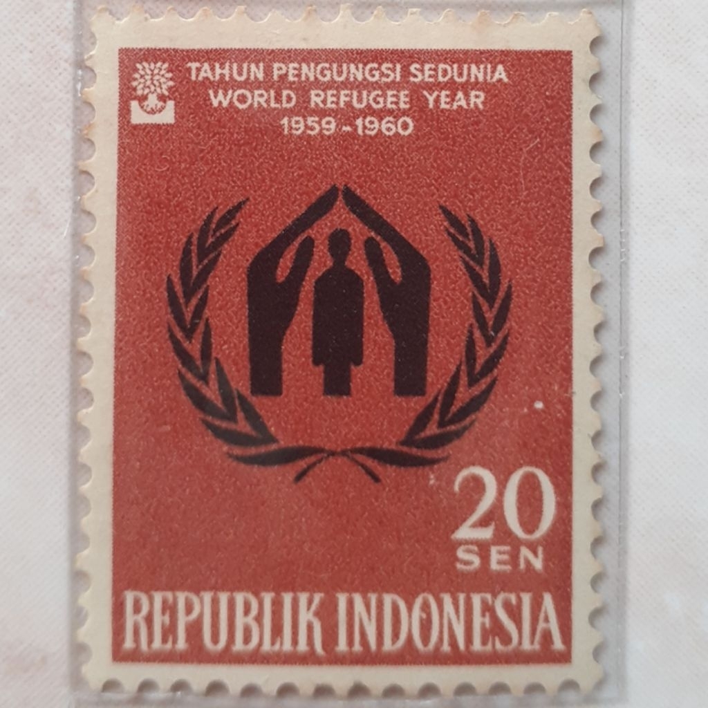 

(ID2) Perangko Indonesia Tahun Pengungsi Sedunia (Rp 1.15) Tahun 1960