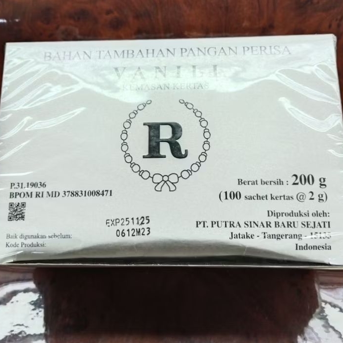 

VANILI KEMASAN KERTAS BAHAN PERISA ISI 100( 1 KOTAK)