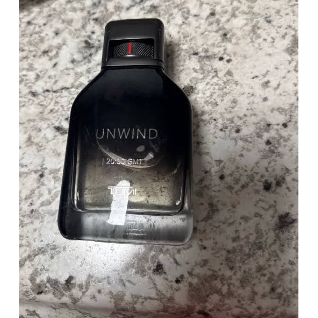 preloved parfum TUMI Unwind