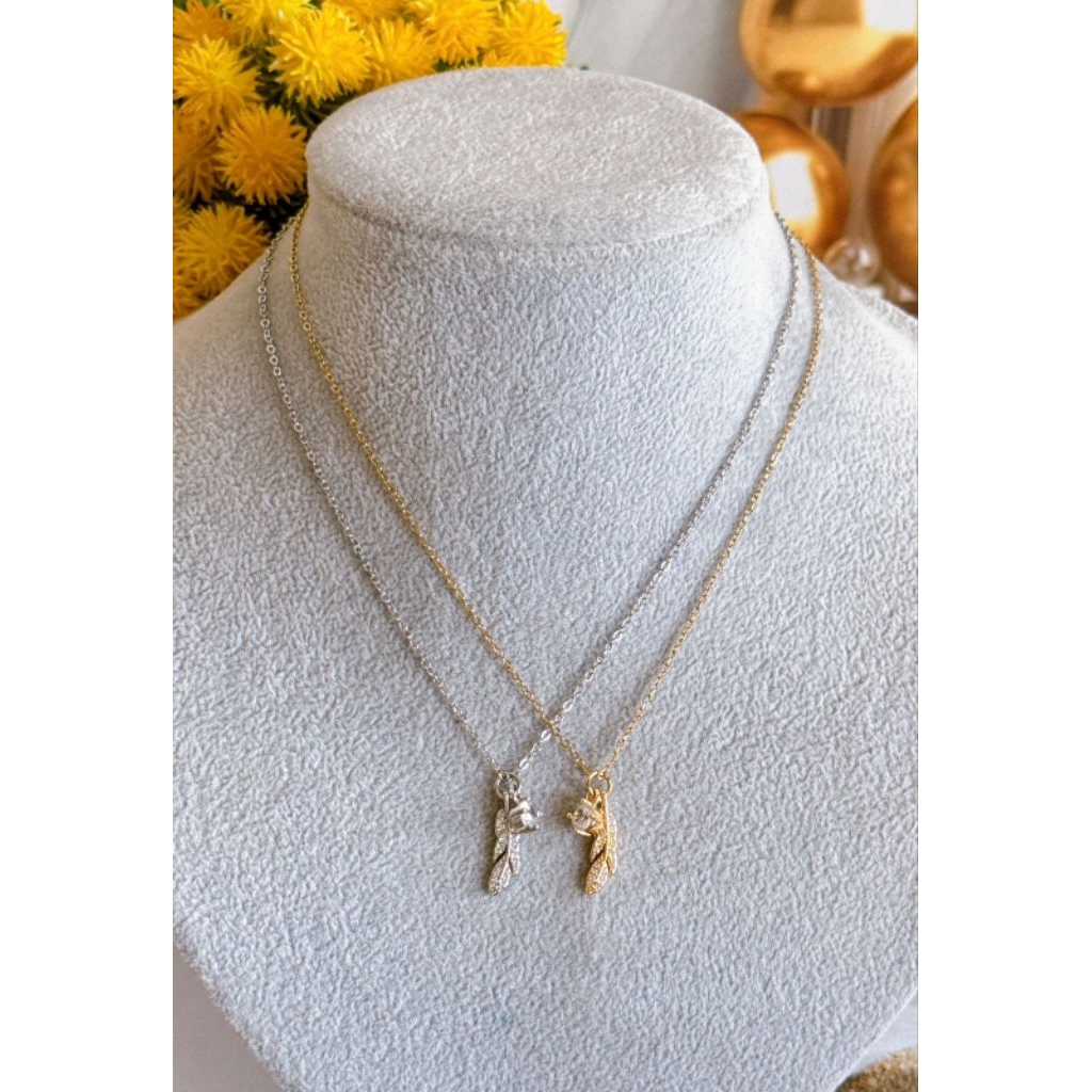 Kalung titanium bulu ayam