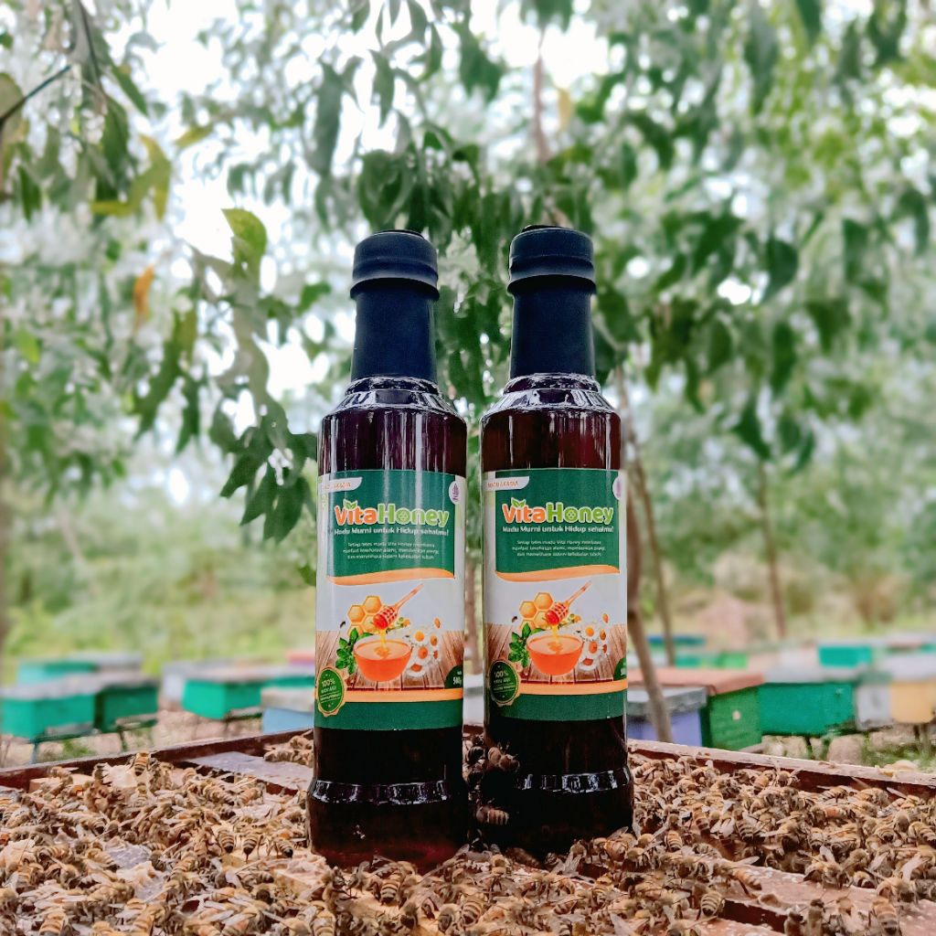 

Vitahoney Madu Hutan Akasia Asli Riau Madu Akasia Raw Honey 1Kg Kemasan Dua botol 500gr