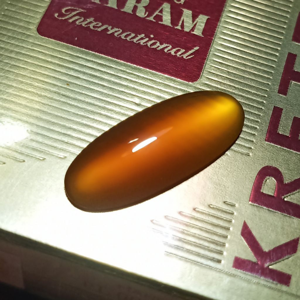 Batu Raflesia Luster Cat's Eye - Orange Chalcedony