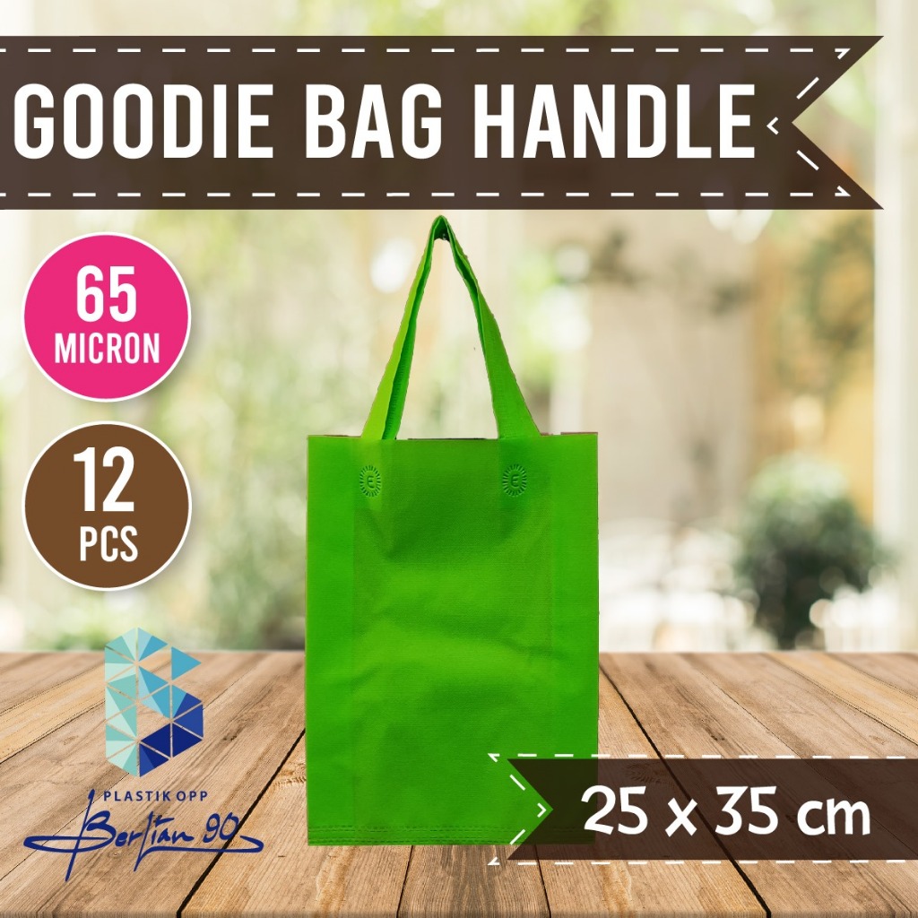 

Tas Spunbond uk 25x35 cm Isi 12 Pcs Tebal 65 gsm / Goodie Bag 25 x 35