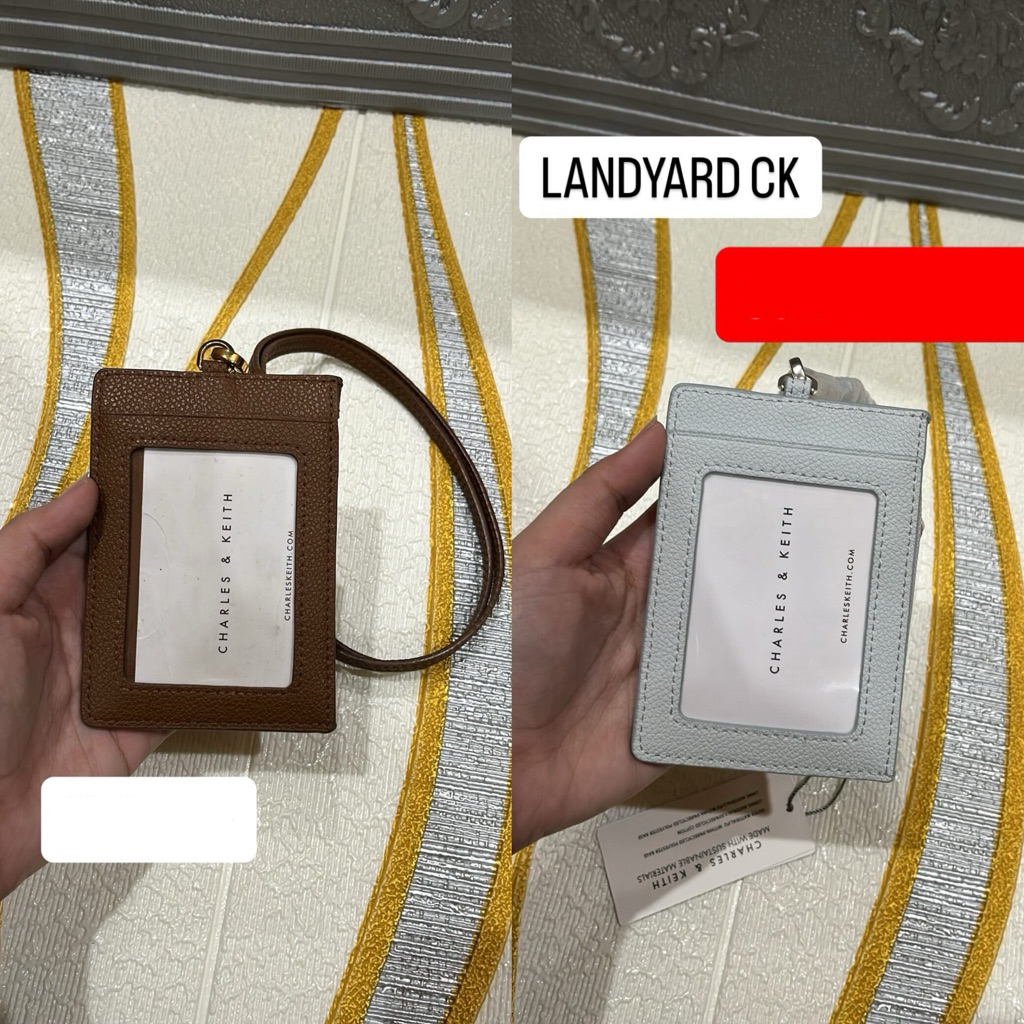 

Charles & Keith Lanyard Brown & Blue - 100% Original