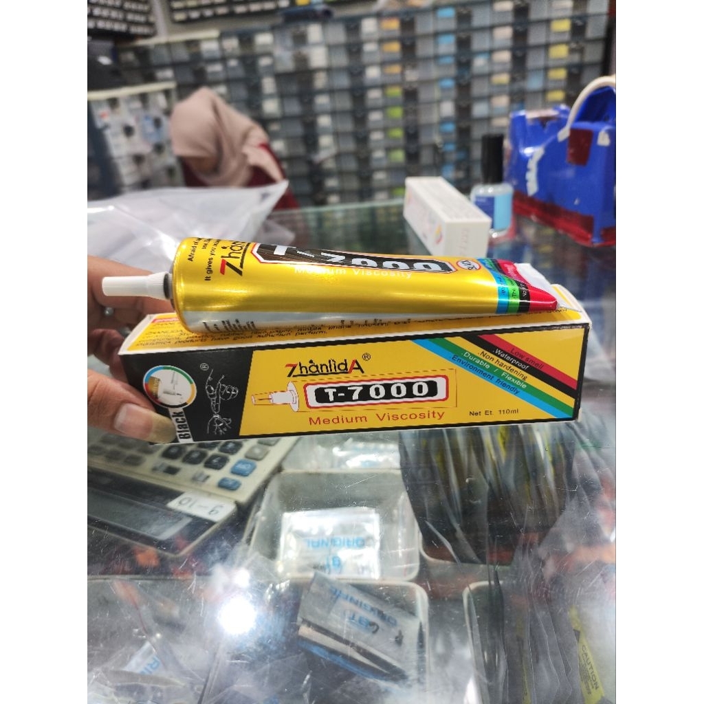 

Lem T7000 110mil merk Zhanlida lem cair lcd backdoor lem hitam