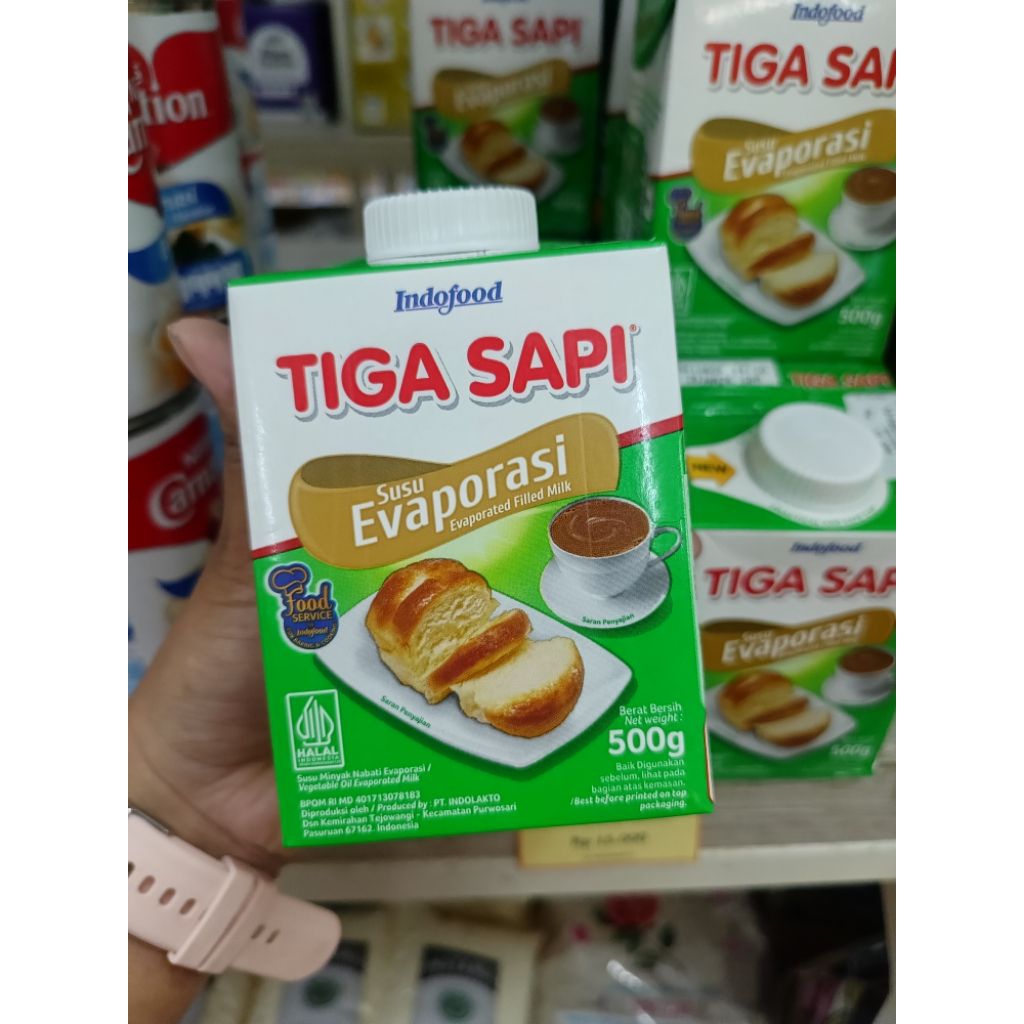 

Susu evaporasi Tiga Sapi