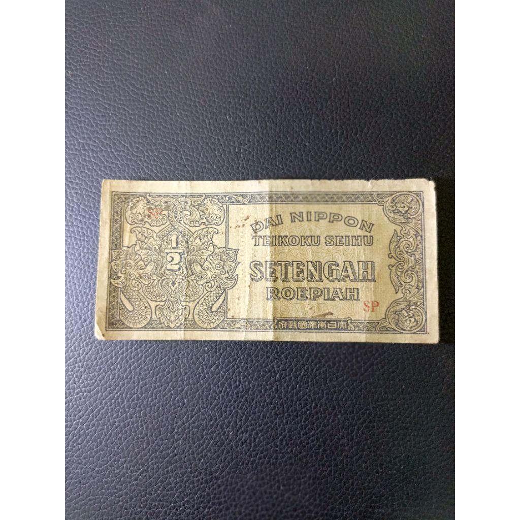 Uang kuno Indonesia 1/2 Rupiah thn 1943 Dai Nippon Teikoku Seihu