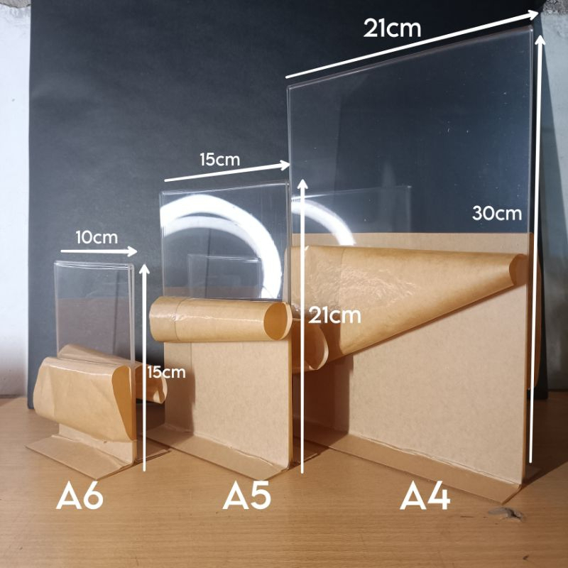 

AKRILIK TEMPAT DISPLAY BROSUR / TENT AKRILIK MODEL T / STAND QRIS A4 A5 A6