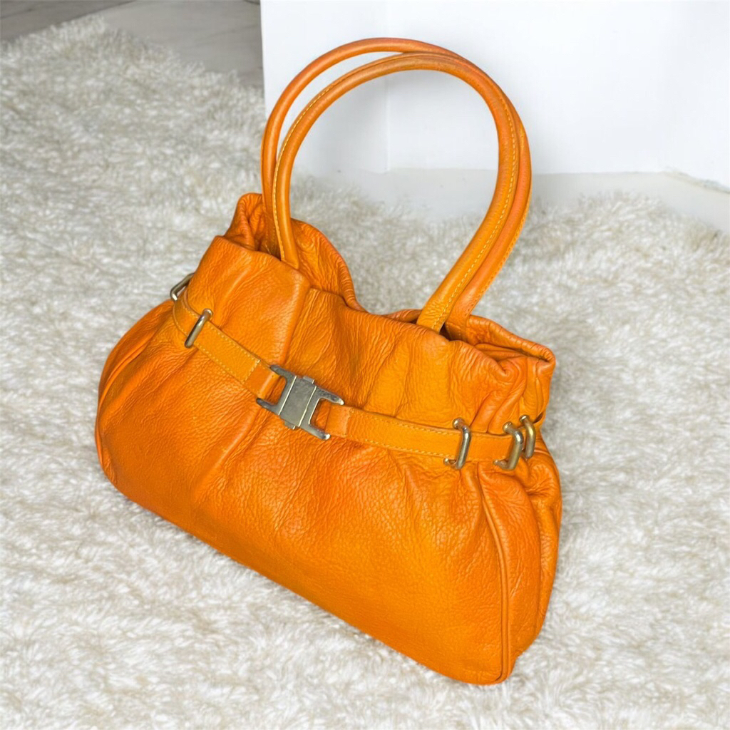 tas preloved bahan kulit asli warna orange brand ABRO Italy