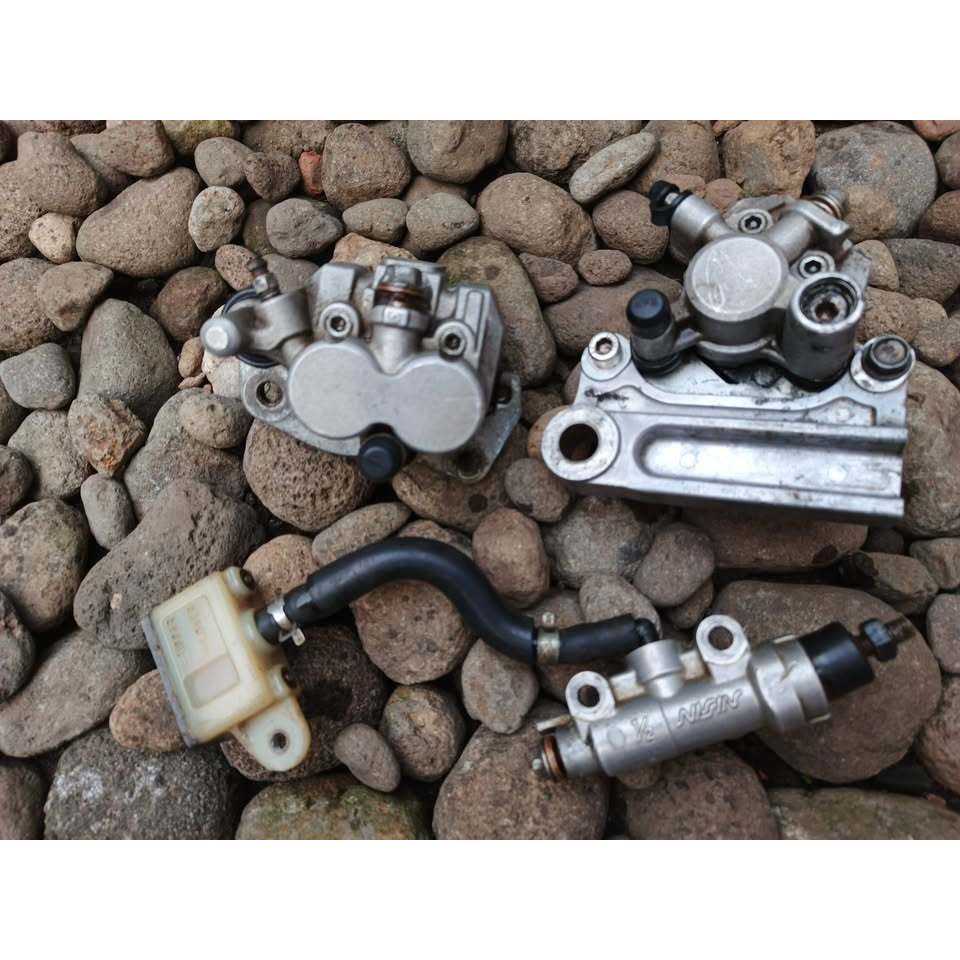 Kawasaki KLX kaliper set depan belakang original
