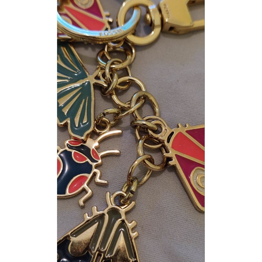 fossil key fob gold