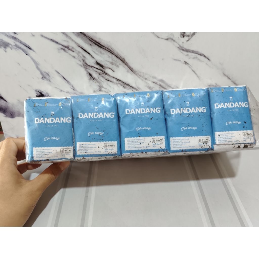 

Teh Dandang biru 1 pak )