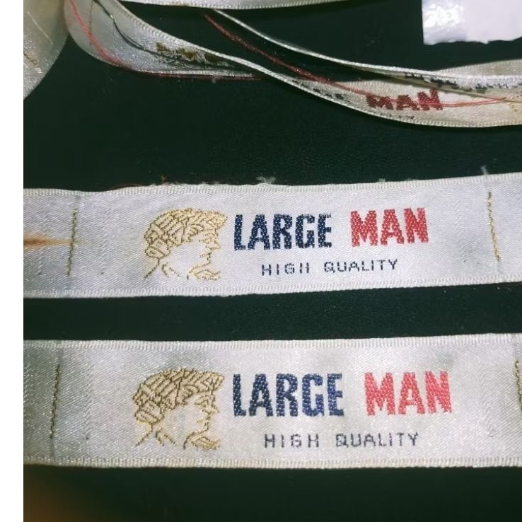 

label merek label (main) tag large man
