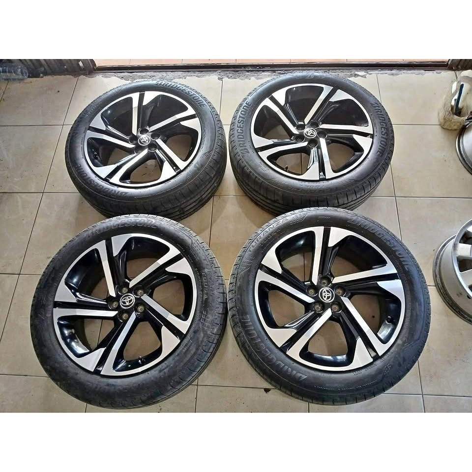VELG MOBIL STD YARIS CROOS R18 LEBAR 7 PCD 5X100 + BAN BRIDGESTONE 215 55 R18