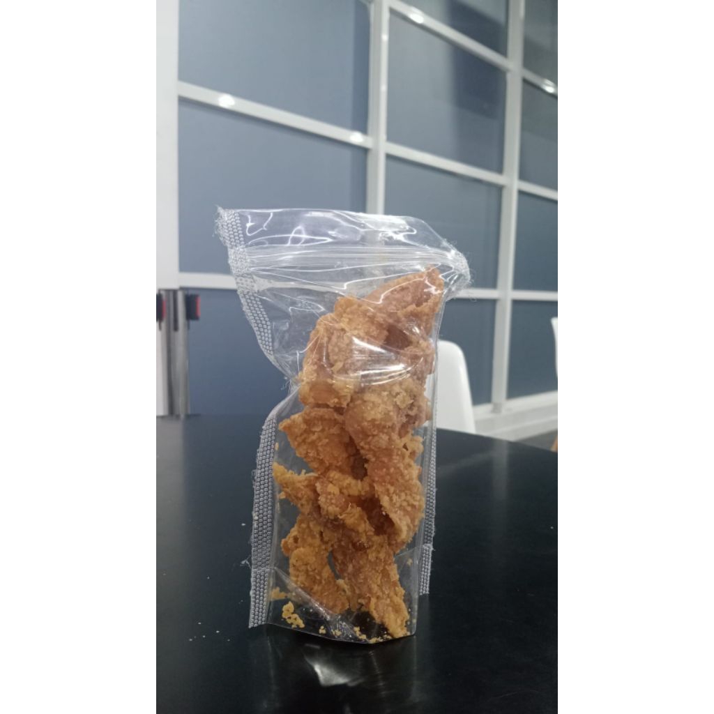 

Keripik Kulit Ayam Krispi 90 Gram