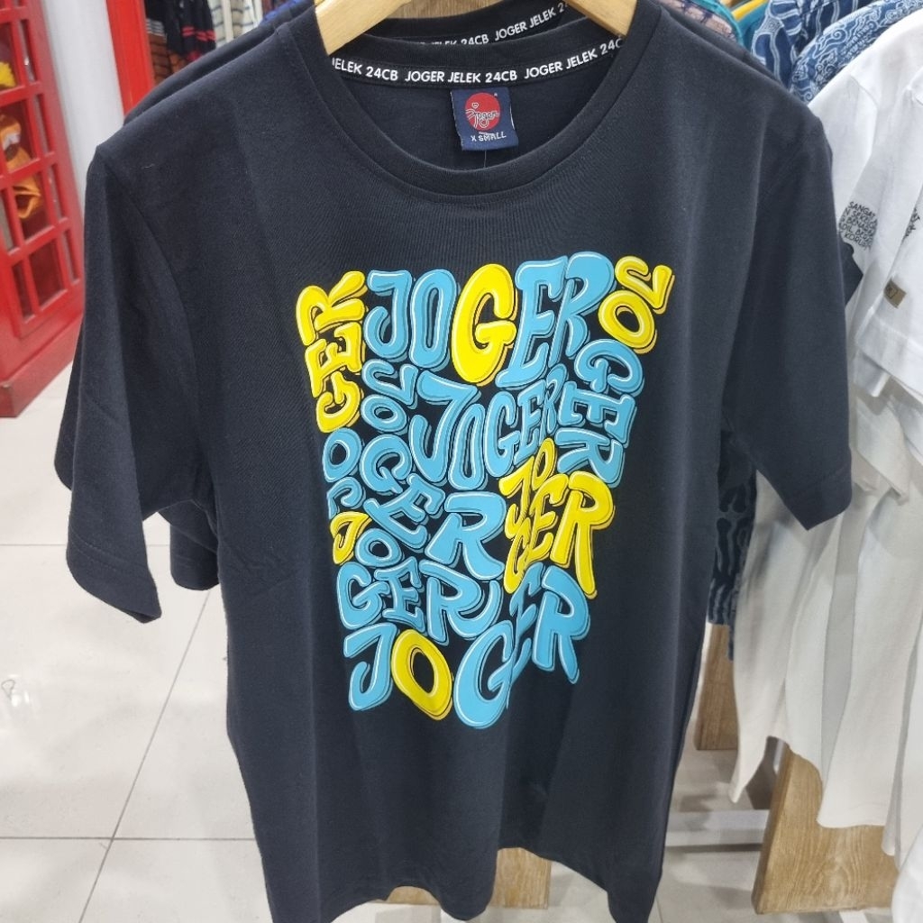 KAOS JOGER ORIGINAL. KAOS HITAM MOTIF JOGER. OLEH OLEH BALI