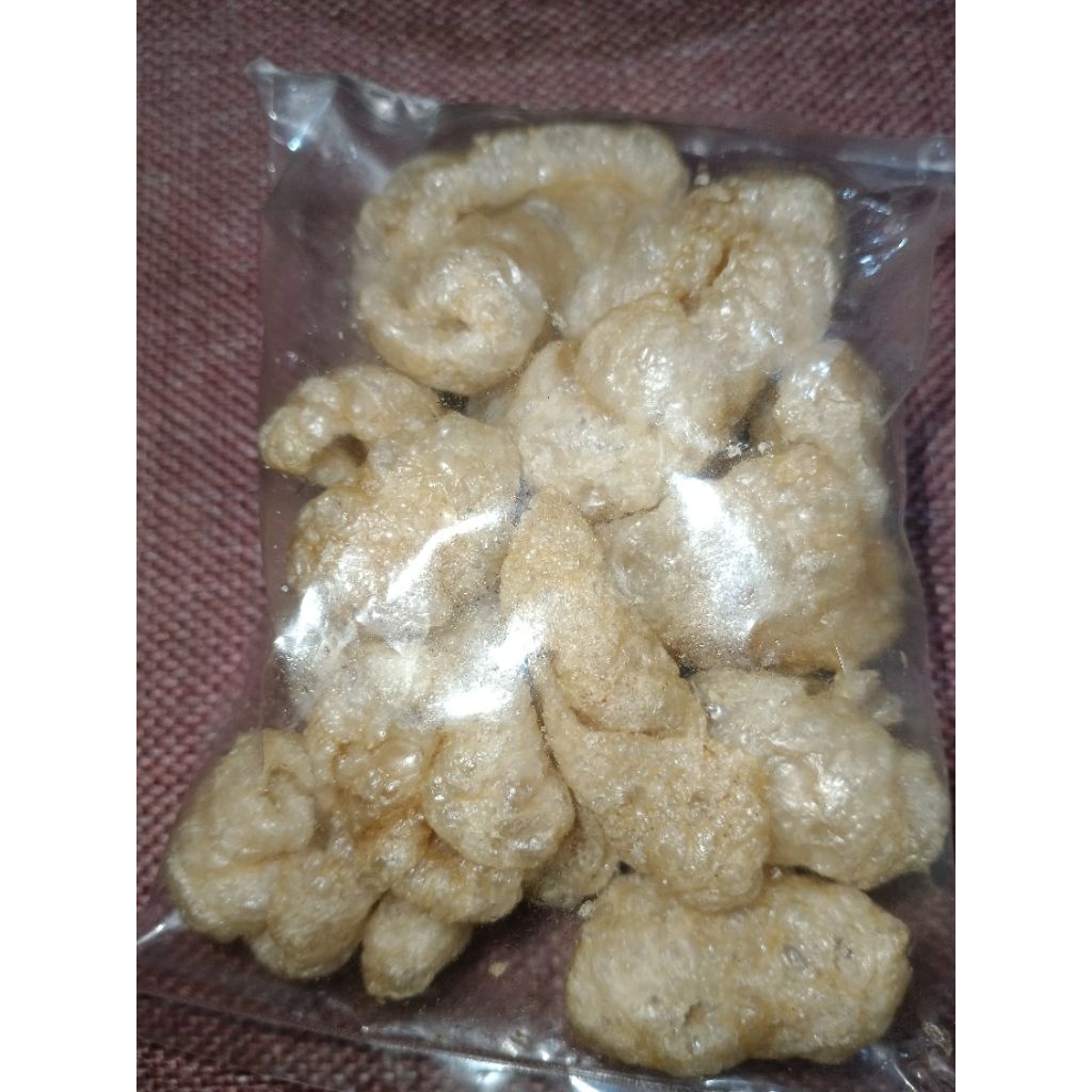 

Kerupuk kulit babi asli gurih dan garing