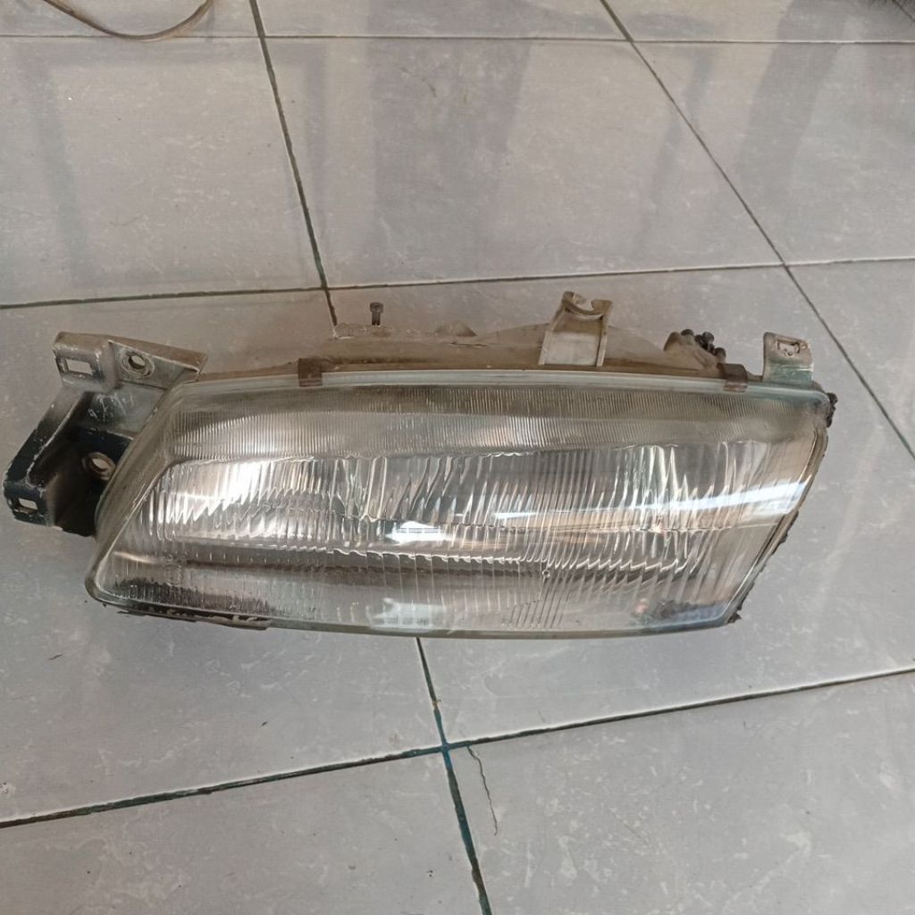 headlamp kiri timor KIA original